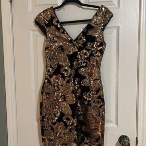 Guess gold and black drsss